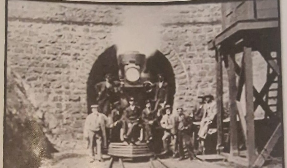 The first train posed at the Lyttelton tunnel entrance