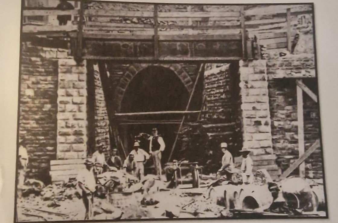 Historic photograph of workers at the Lyttelton rail tunnel entrance